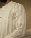 LUREX -shirt and patchworked Dhothi